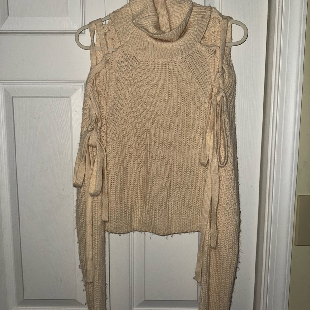 Cozy Cream Sweater with Unique Tie Details